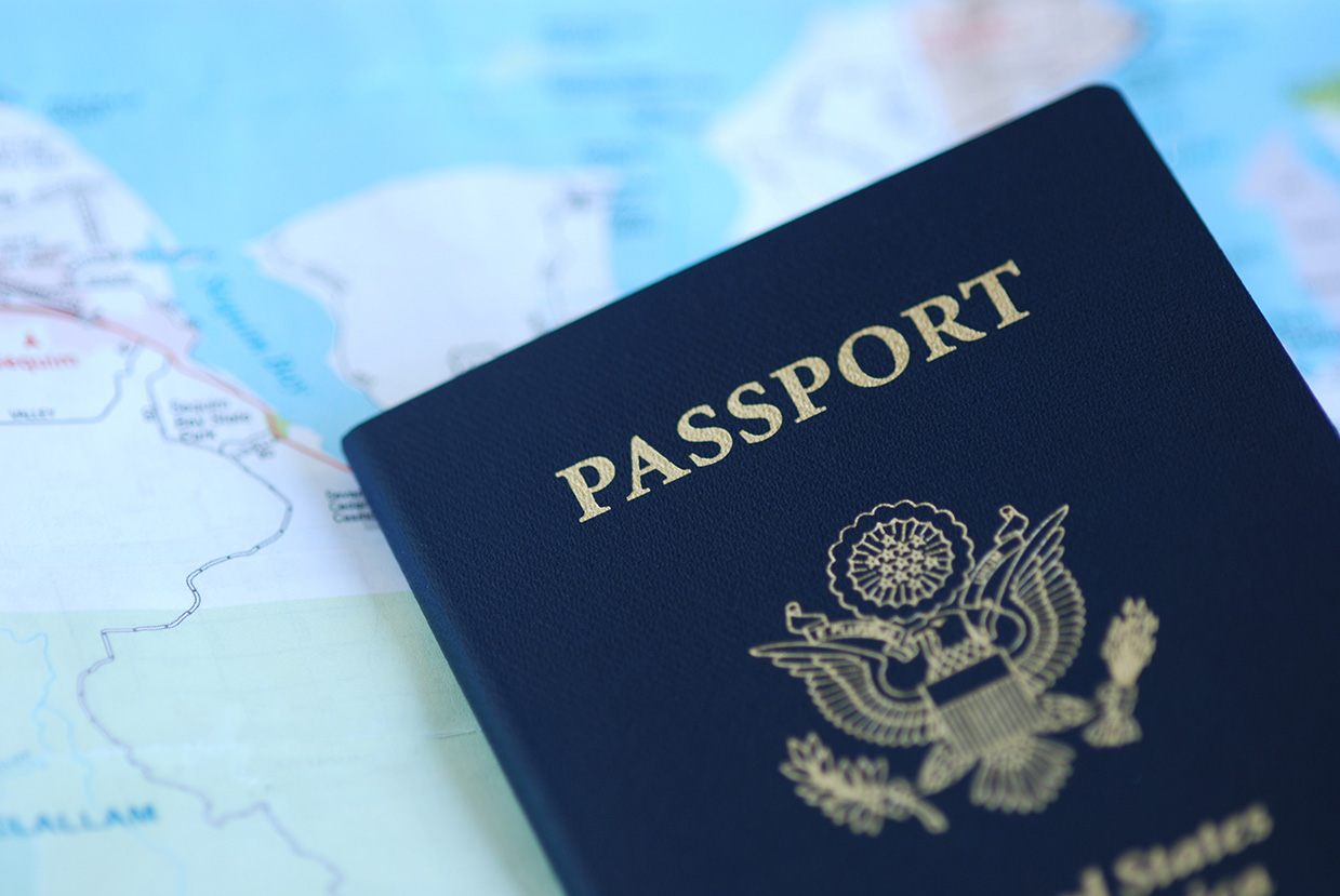 Image of a passport on a map.