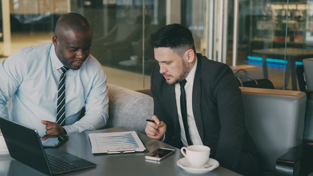 2 business men meeting